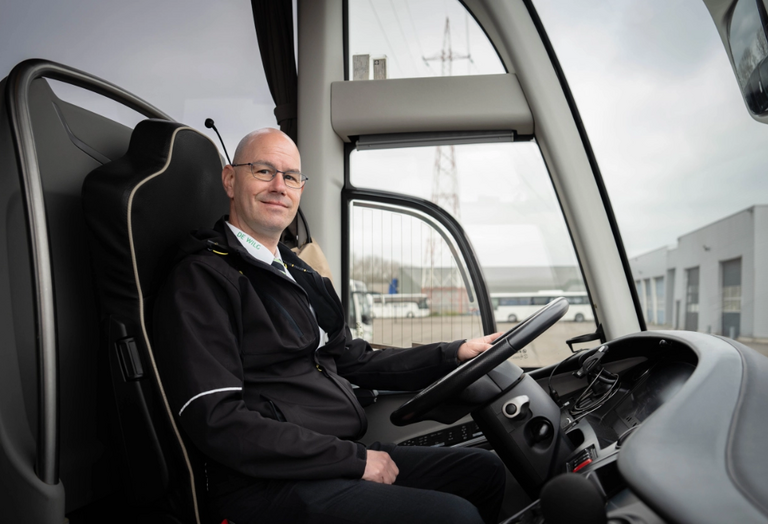 Bus driver behind the wheel